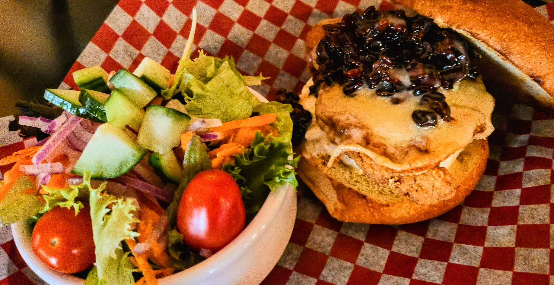 maple chicken sandwich with side salad
