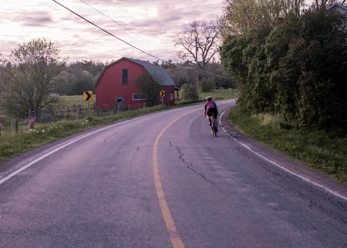 Cyclists on a curved road